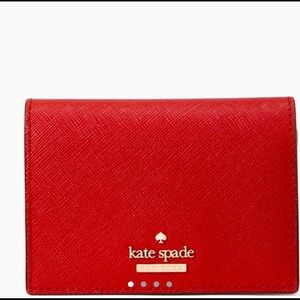 Kate spade wallet, with box almost new.